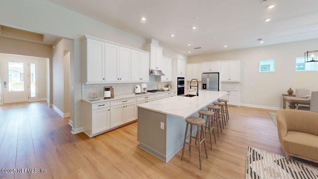 Furnished interior view inside a new home in RiverTown - WaterSong, St. Johns (Image 4).