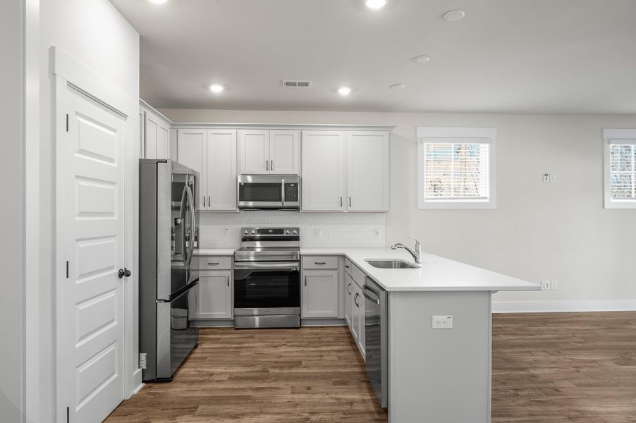 Furnished interior view inside a new home in Windward Townes, Goose Creek (Image 2).