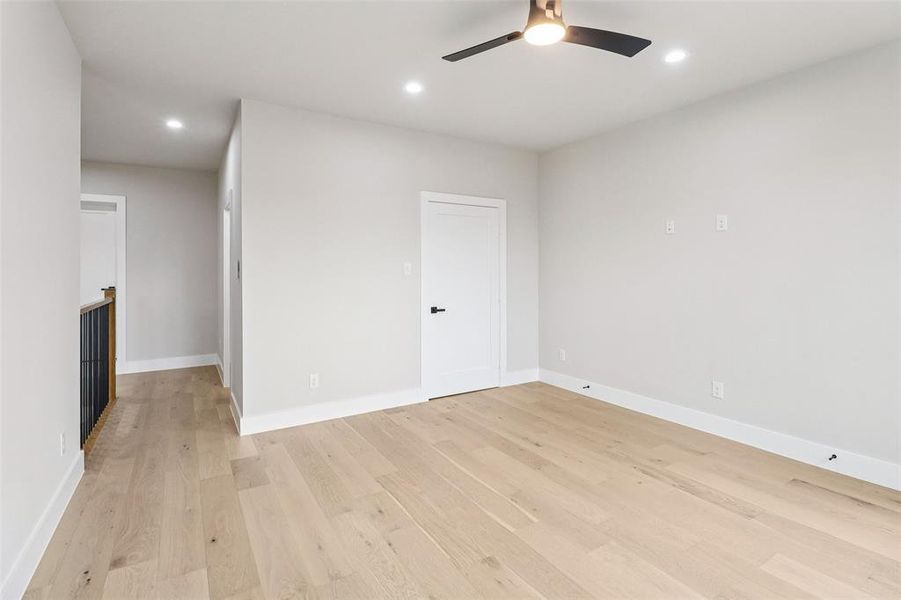 Spare room featuring ceiling fan, recessed lighting, and light wood-style flooring