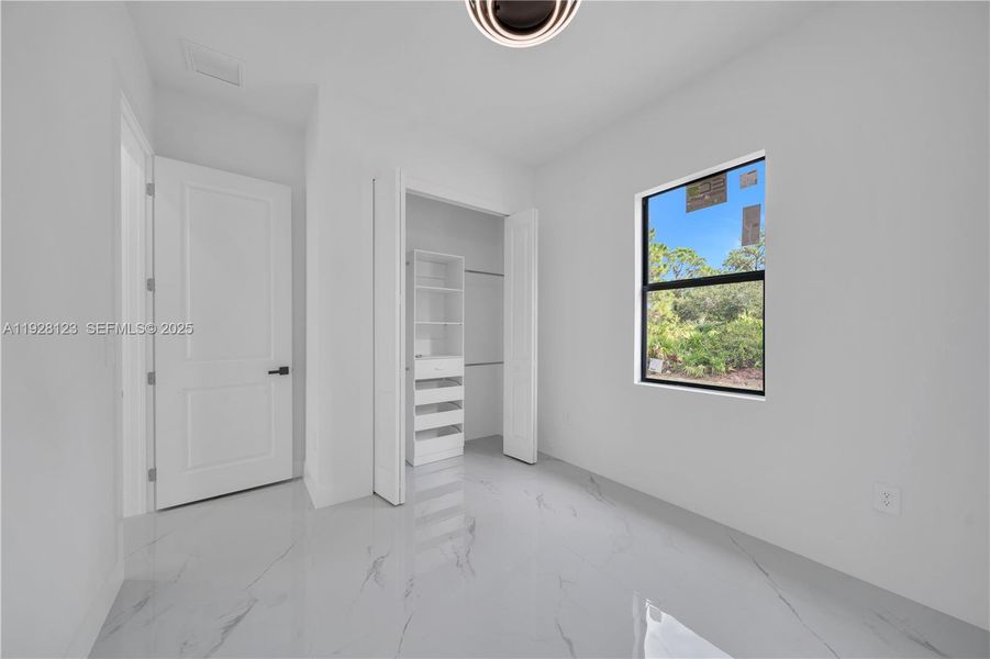 Spacious, unfurnished interior of a new home in , Lehigh Acres (Image 13). Spacious, unfurnished interior of a new home in , Lehigh Acres (Image 13).