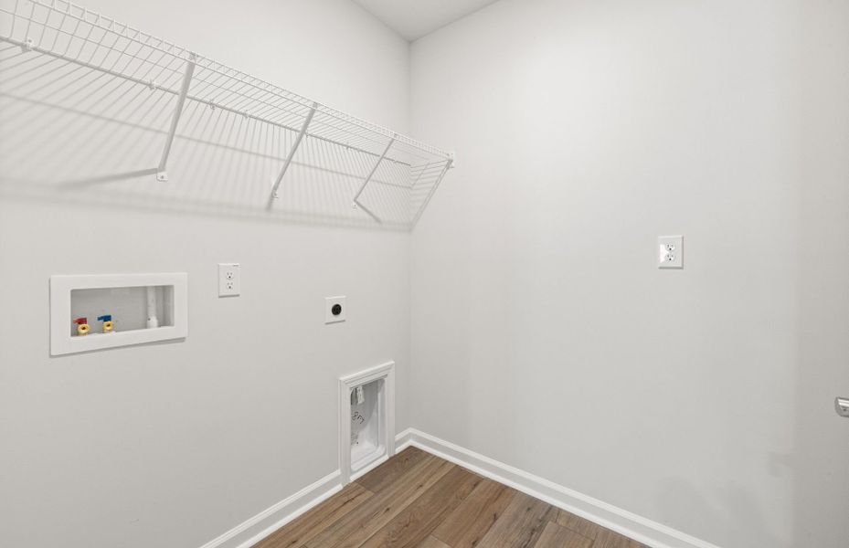 Representative unfurnished interior of a home built from the Oriole by Centex in Carpenter Falls, Durham (Image 19).