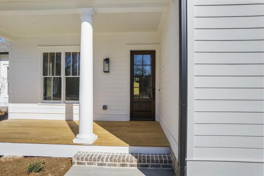 Front exterior of a new home in , Madison, GA, highlighting curb appeal (Image 26).