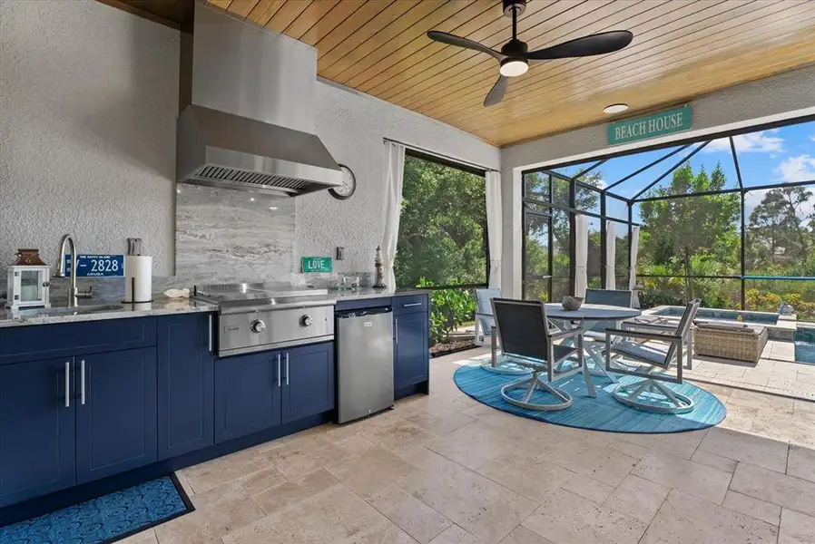Exterior details and patio area of a home in , Englewood (Image 3).