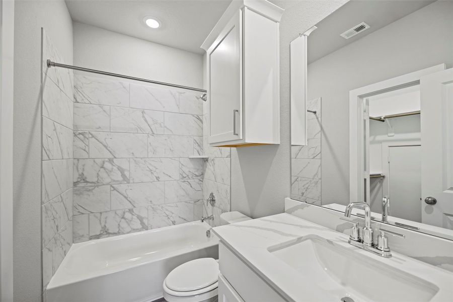 A true bonus bathroom that adds versatility and value to the home.