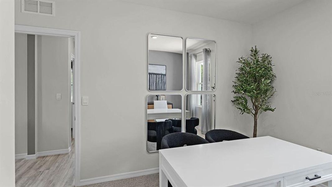 Furnished interior view inside a new home in Lake Deer Estates, Poinciana (Image 27).