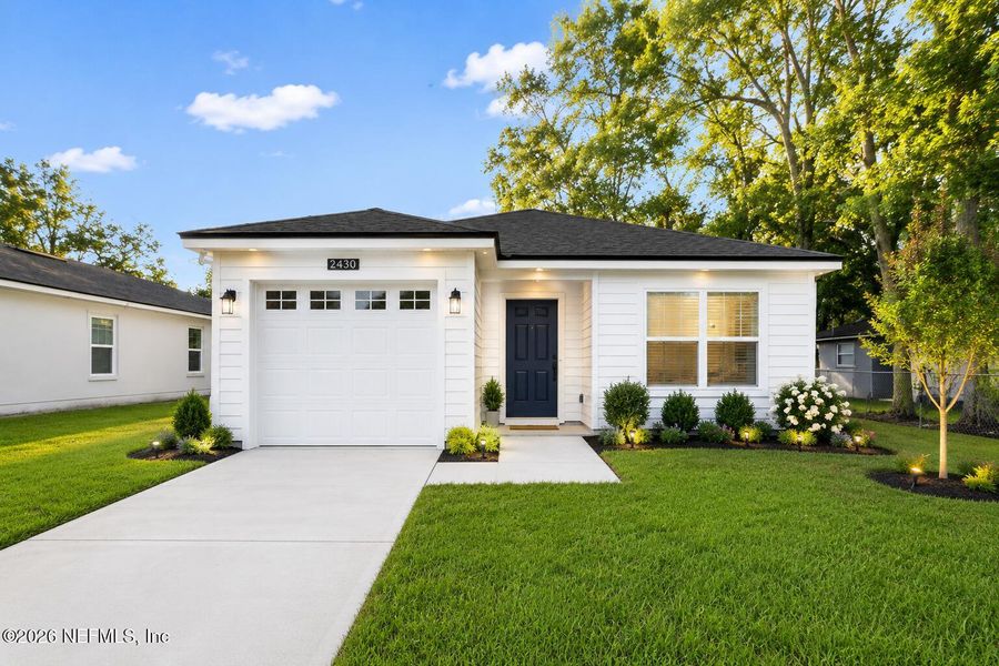 Front exterior of a new home in , Jacksonville, FL, highlighting curb appeal (Image 1). Front exterior of a new home in , Jacksonville, FL, highlighting curb appeal (Image 1).