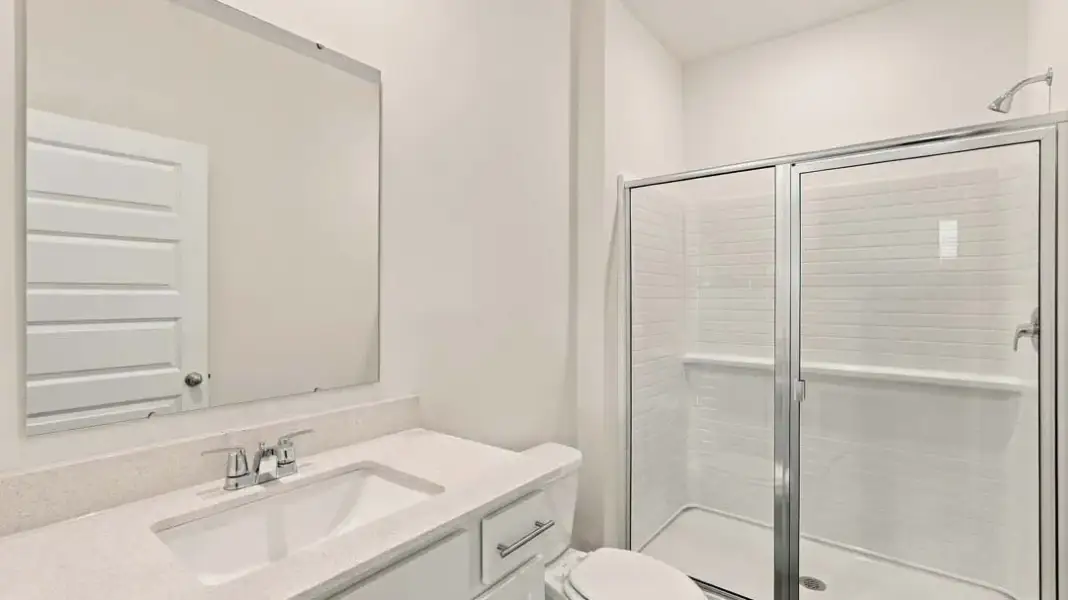 Furnished interior view inside a new home in The Lakes at North Glynn, Brunswick (Image 10).