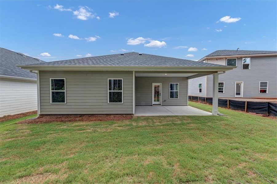 Exterior details and patio area of a home in Canterbury Villas, Carrollton (Image 21).