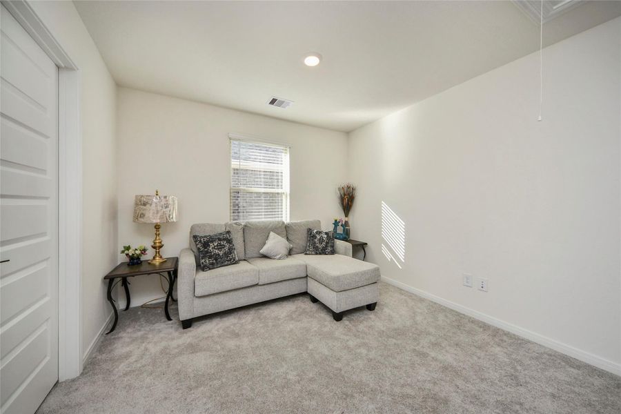 Furnished interior view inside a new home in Sunterra North, Katy (Image 6).