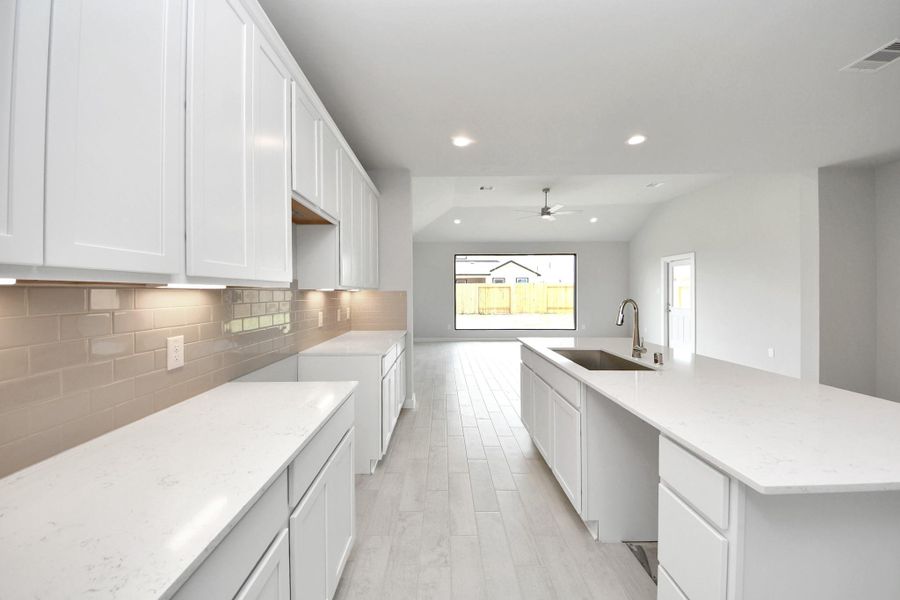 All of this overlooks your expansive family room, creating a perfect space for culinary delights and family gatherings. All of this overlooks your expansive family room, creating a perfect space for culinary delights and family gatherings.