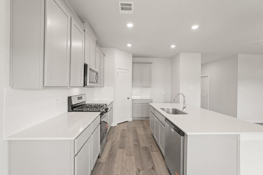 Furnished interior view inside a new home in Woodshore, Clute (Image 7). Furnished interior view inside a new home in Woodshore, Clute (Image 7).