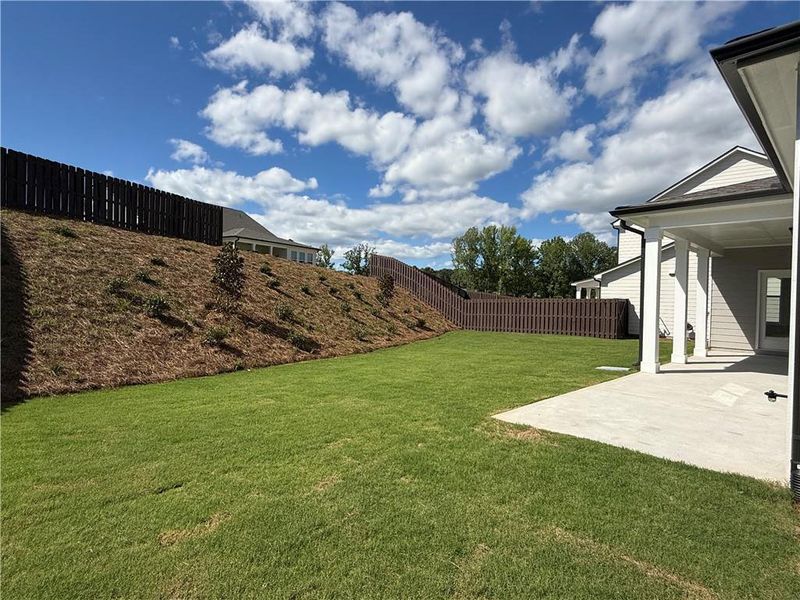 Exterior details and patio area of a home in Ponderosa Farms Reserve, Gainesville (Image 4).