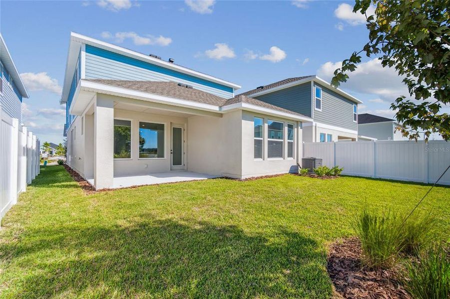 Exterior details and patio area of a home in Persimmon Park - Garden Series, Wesley Chapel (Image 29).