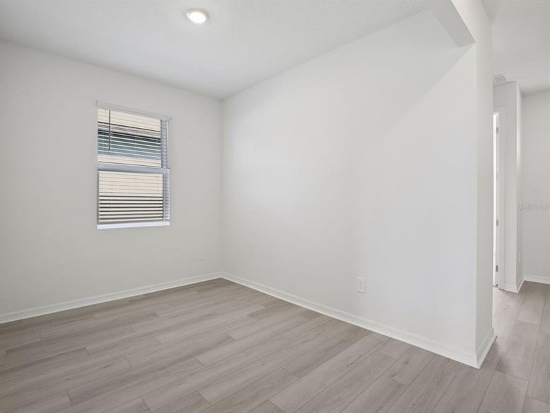 Spacious, unfurnished interior of a new home in Coasterra - Reserve Series, Palmetto (Image 20).