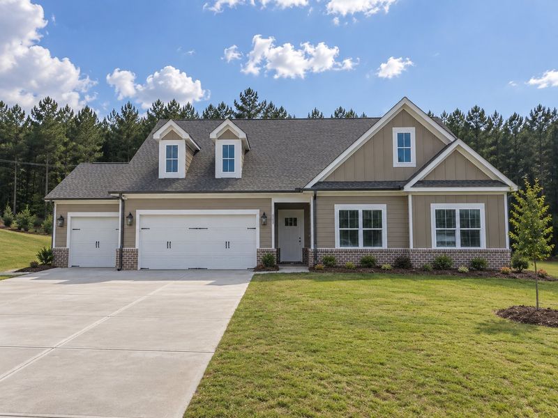 Front exterior of a new home in Cherokee Knoll, Williamston, SC, highlighting curb appeal (Image 1). Front exterior of a new home in Cherokee Knoll, Williamston, SC, highlighting curb appeal (Image 1).