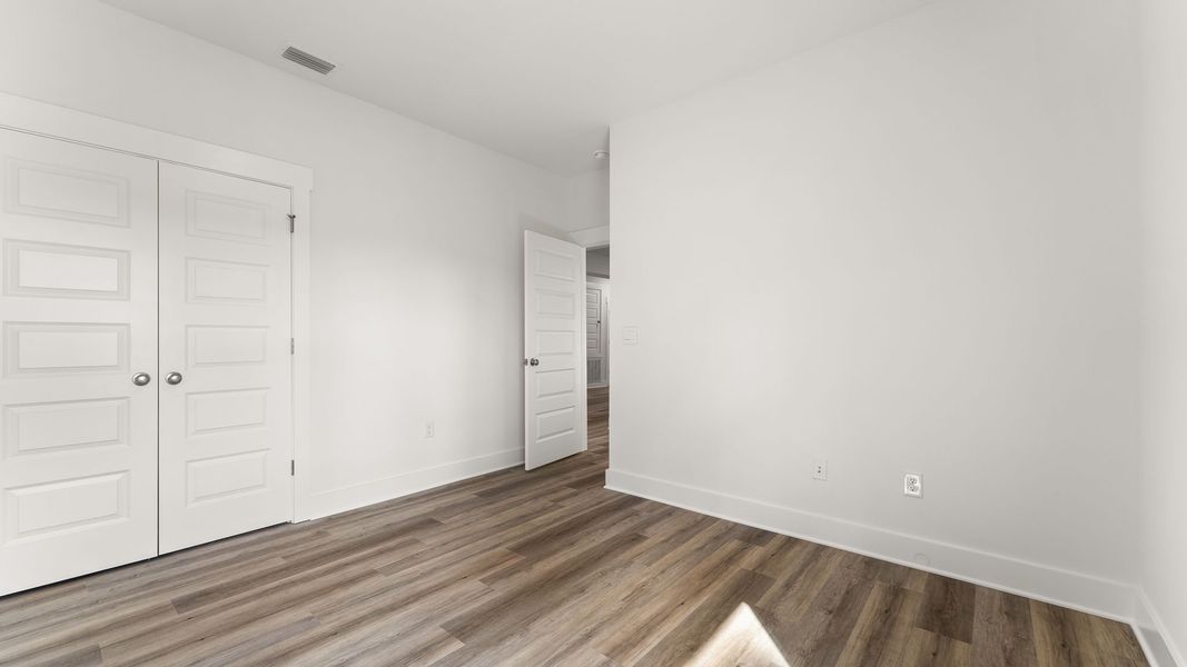 Representative unfurnished interior of a home built from the Kennedy by D.R. Horton in Holley Grove at Peach Creek, Santa Rosa Beach (Image 22). Representative unfurnished interior of a home built from the Kennedy by D.R. Horton in Holley Grove at Peach Creek, Santa Rosa Beach (Image 22).