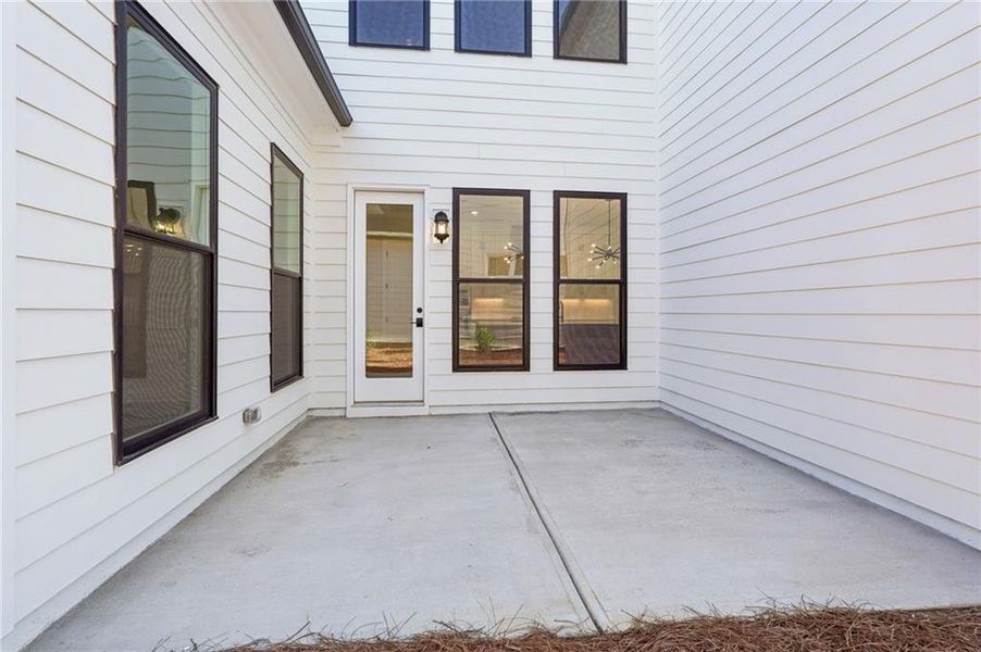 Exterior details and patio area of a home in Promenade at Sawnee Village, Cumming (Image 3). Exterior details and patio area of a home in Promenade at Sawnee Village, Cumming (Image 3).