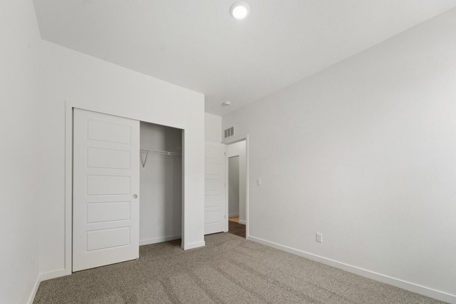 Spacious, unfurnished interior of a new home in Union Colony West, Greeley (Image 48).