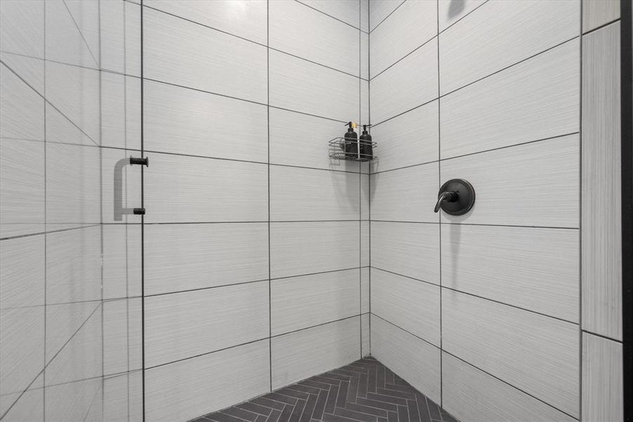 Bathroom with tiled shower Bathroom with tiled shower