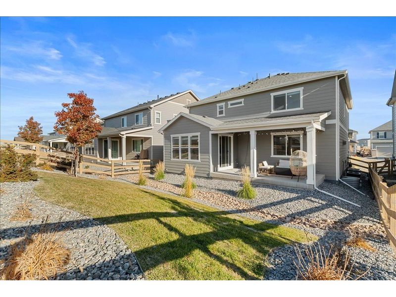Exterior details and patio area of a home in Prairie Song, Windsor (Image 27).