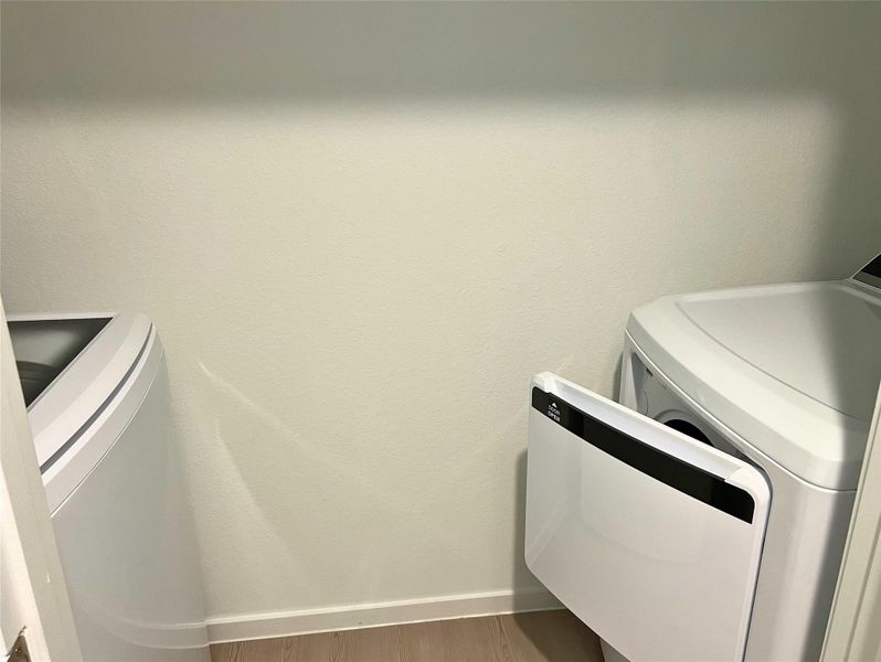 Laundry Room with new washer and dryer