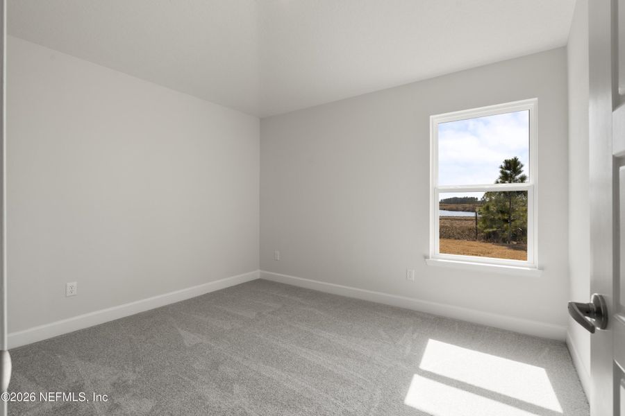 Spacious, unfurnished interior of a new home in Shadow Crest at Rolling Hills, Green Cove Springs (Image 11).