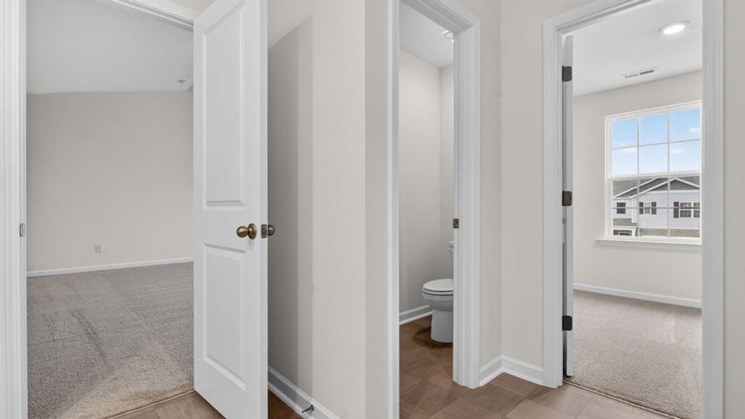 Spacious, unfurnished interior of a new home in Gretchen Pines, West End (Image 31).