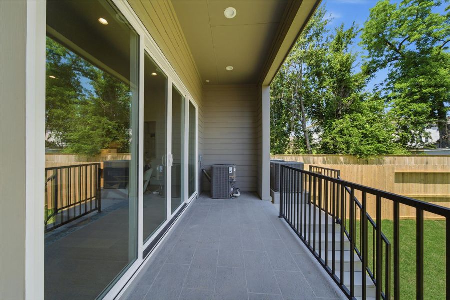 Exterior details and patio area of a home in , Houston (Image 29).
