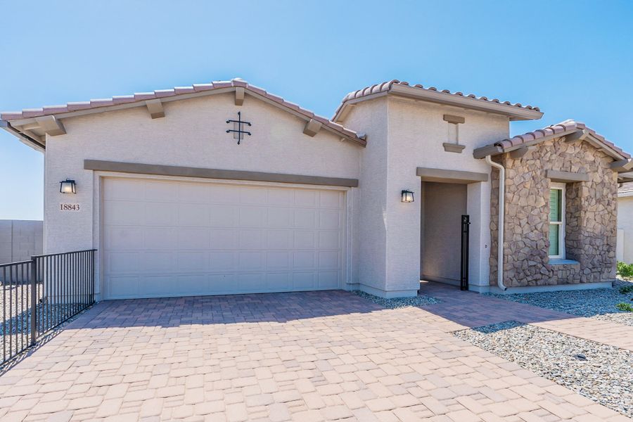 Representative exterior photo of a completed home built from the Hacienda Series - Cinnabar by Brightland Homes in Canyon Views - Hacienda, Litchfield Park, AZ (Image 28).