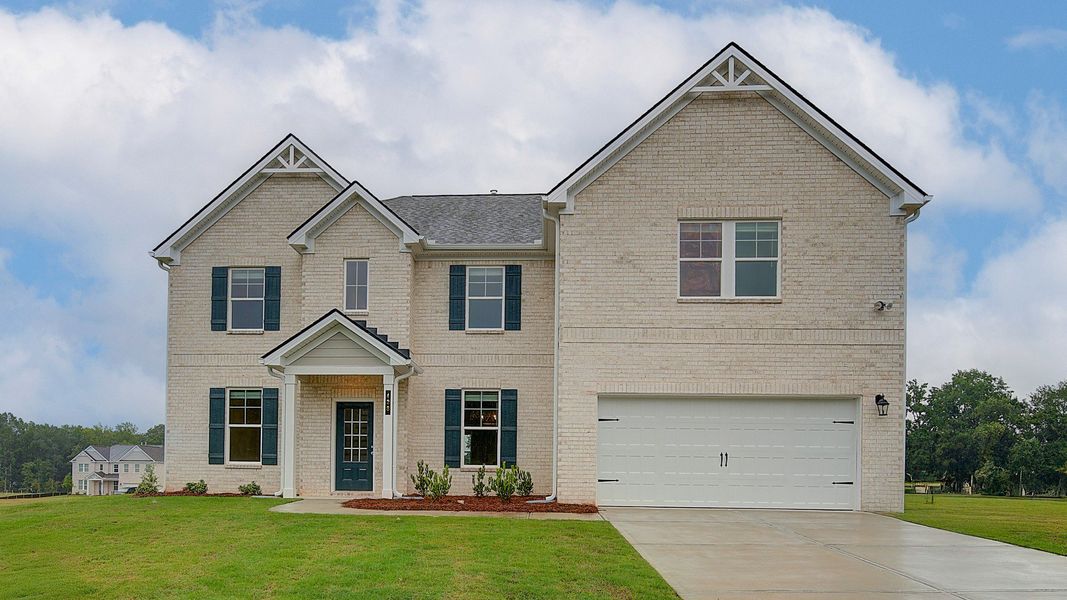 Representative exterior photo of a completed home built from the McKinley by DRB Homes in Westwind Estates, Hampton, GA (Image 20).