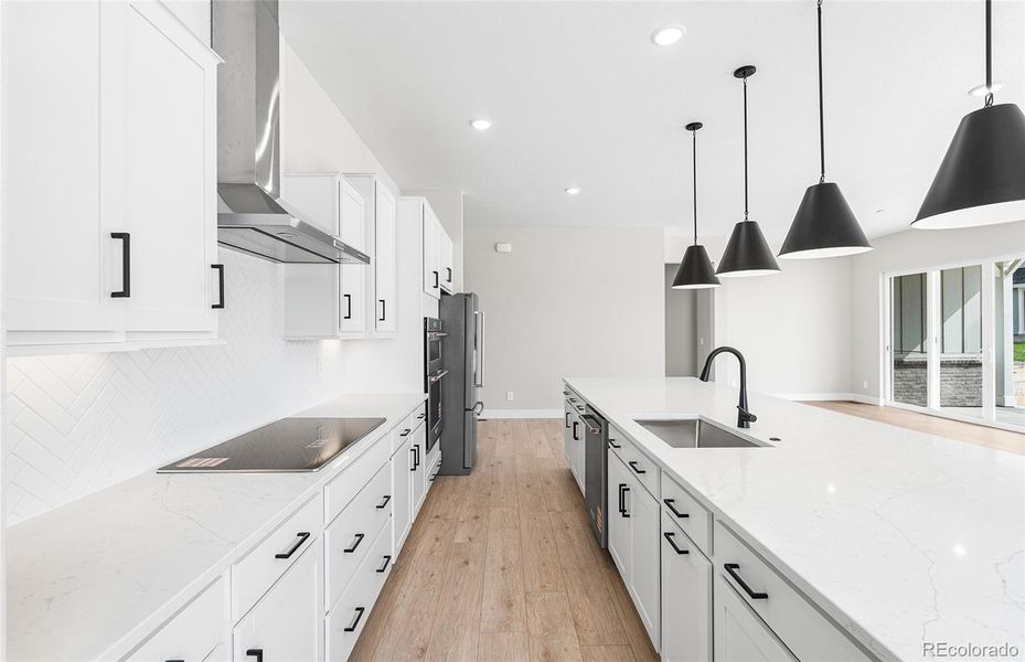 Furnished interior view inside a new home in Hilltop at Inspiration, Aurora (Image 8).