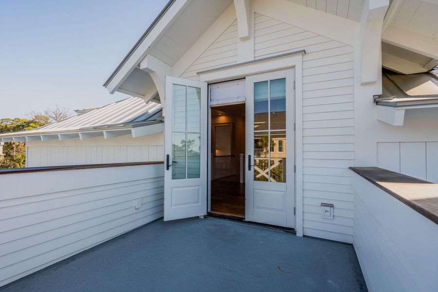 Exterior details and patio area of a home in , Folly Beach (Image 48).