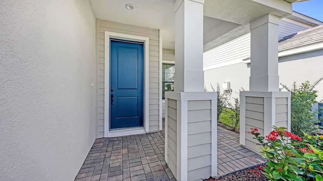 Exterior details and patio area of a home in Palm Grove Real Estate and Homes for Sale in Lakewood Ranch, FL - Neal Communities, Lakewood Ranch (Image 20). Exterior details and patio area of a home in Palm Grove Real Estate and Homes for Sale in Lakewood Ranch, FL - Neal Communities, Lakewood Ranch (Image 20).