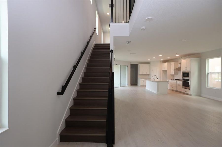 Spacious, unfurnished interior of a new home in Lake Star at Ovation, Winter Garden (Image 36).