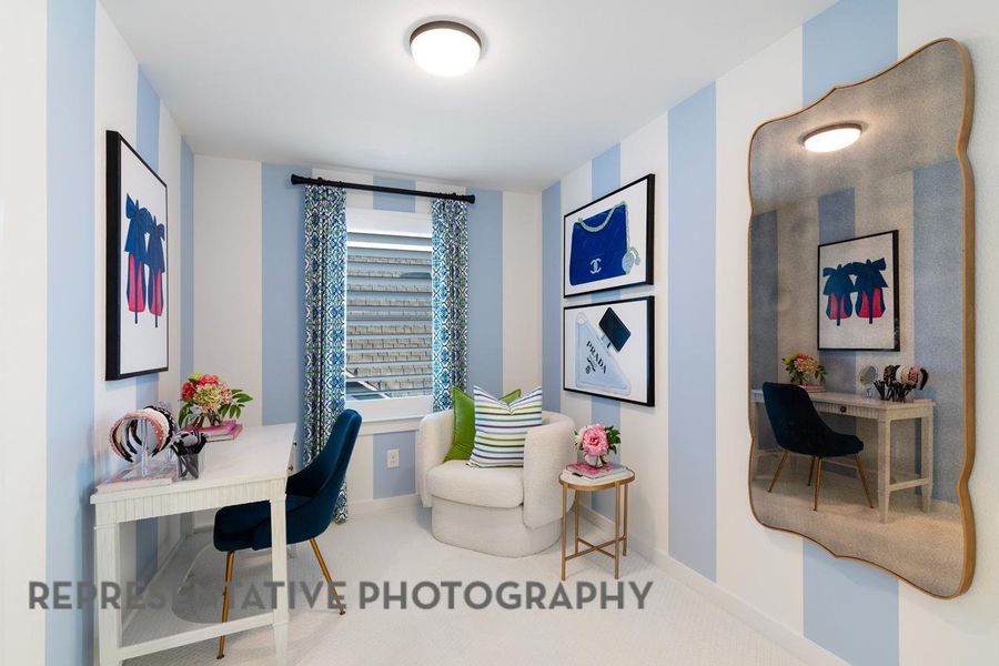 Carpeted office space featuring baseboards Carpeted office space featuring baseboards