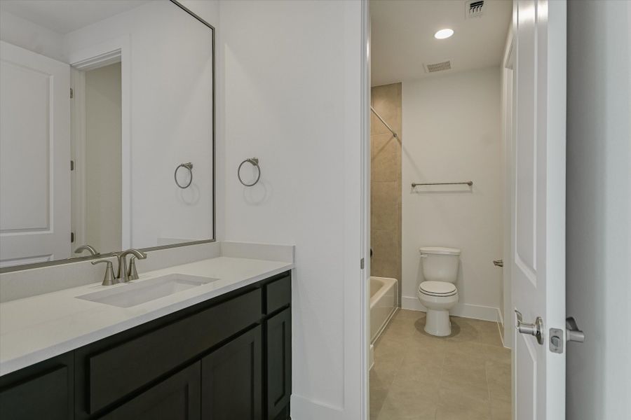 Furnished interior view inside a new home in Scofield Farms Estates, Georgetown (Image 15).