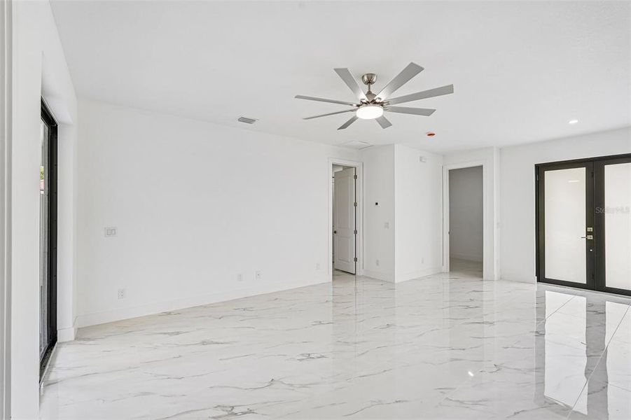 Spacious, unfurnished interior of a new home in , Port Charlotte (Image 30).