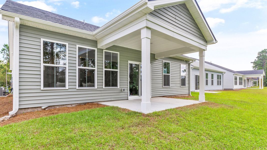 Representative exterior details of a home built from the Chelsea by DRB Homes in Bluffs at Sun Colony, Longs (Image 4).