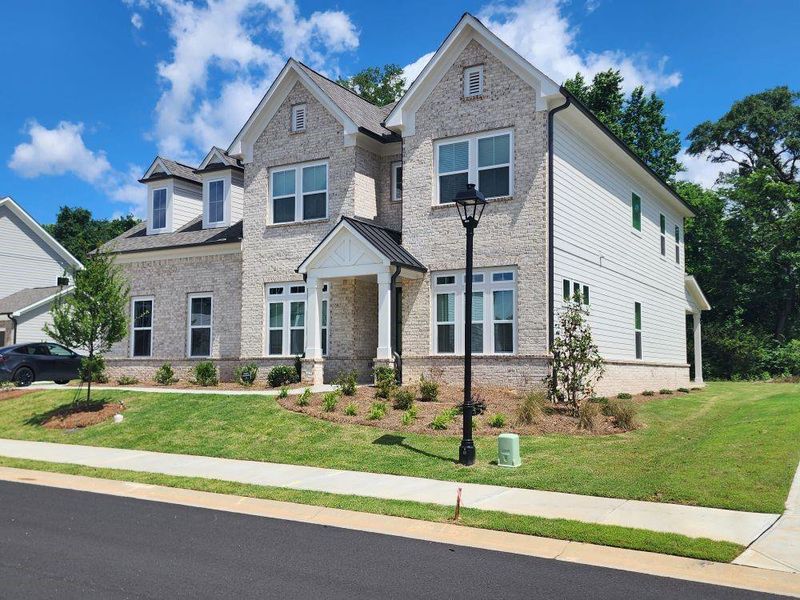 Front exterior of a new home in , Duluth, GA, highlighting curb appeal (Image 2). Front exterior of a new home in , Duluth, GA, highlighting curb appeal (Image 2).