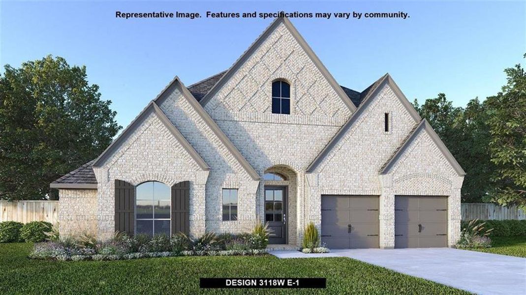 French provincial home with a garage