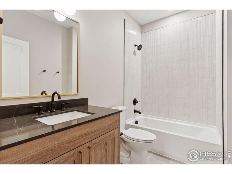 Furnished interior view inside a new home in Harvest LiteLuxe, Berthoud (Image 9).