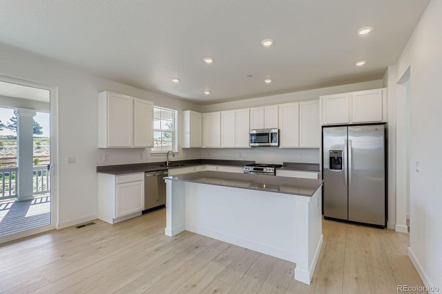 Furnished interior view inside a new home in Sunset Village: The Monarch Collection, Erie (Image 5). Furnished interior view inside a new home in Sunset Village: The Monarch Collection, Erie (Image 5).