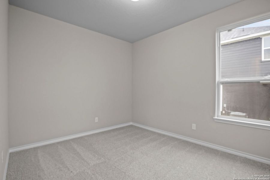 Spacious, unfurnished interior of a new home in The Reserve at Potranco Oaks, Castroville (Image 57).