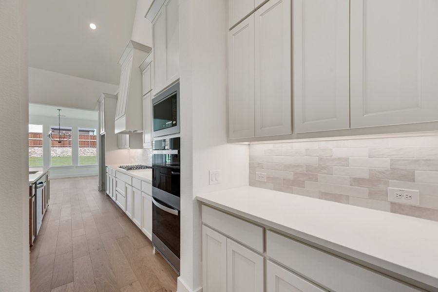 Furnished interior view inside a new home in Winding Creek, Rockwall (Image 9).