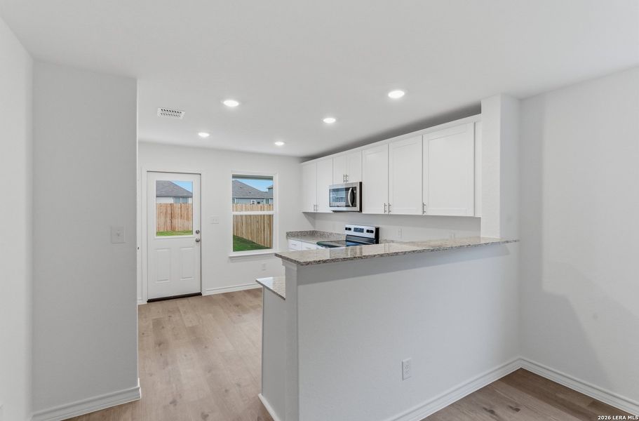 Furnished interior view inside a new home in Dove Song, Marion (Image 6).