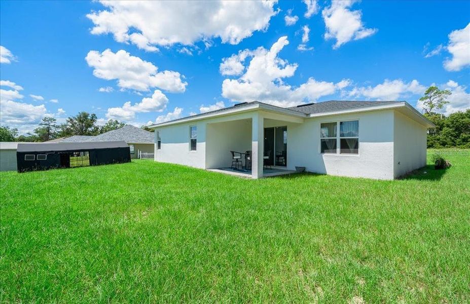 Exterior details and patio area of a home in , Ocala (Image 29).