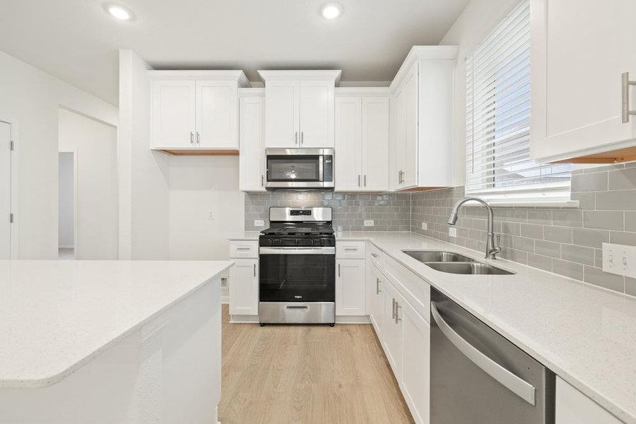 Furnished interior view inside a new home in Sage Hollow, Kyle (Image 4).