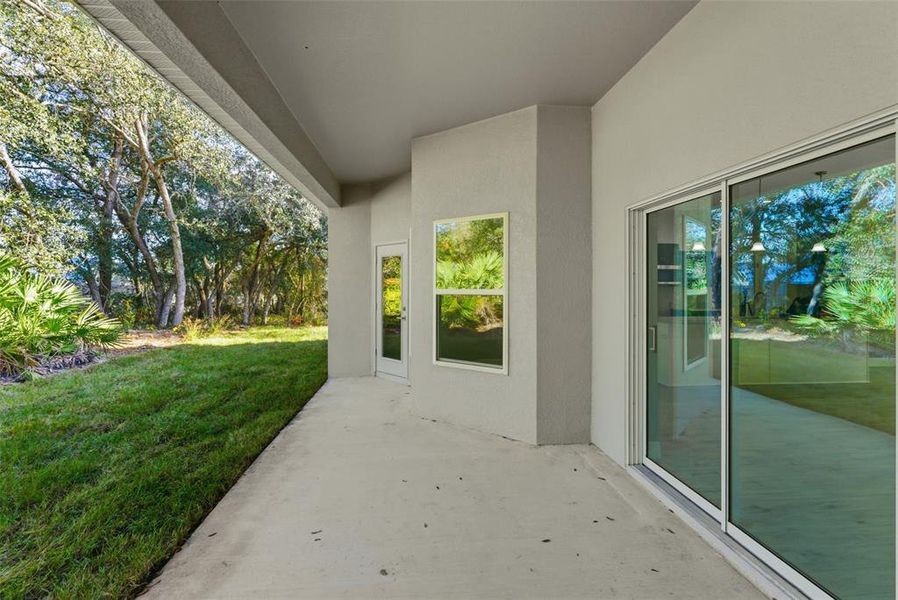 Exterior details and patio area of a home in , Citrus Springs (Image 35).