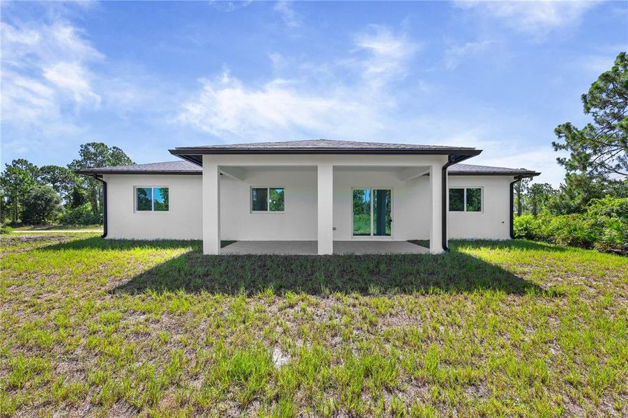 Exterior details and patio area of a home in , Lehigh Acres (Image 3). Exterior details and patio area of a home in , Lehigh Acres (Image 3).