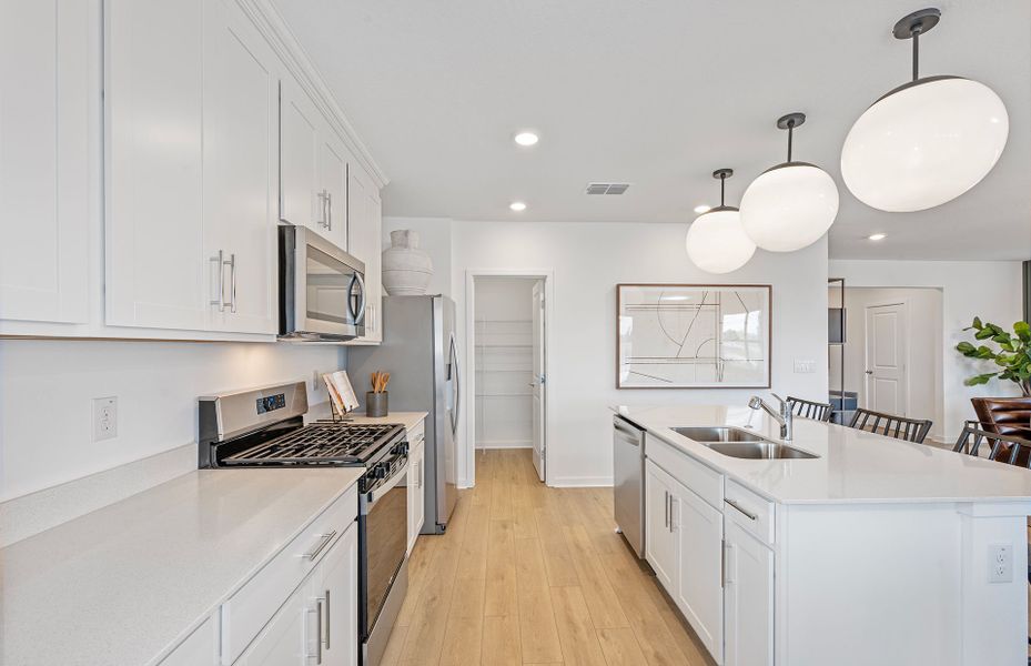 Representative furnished interior of a home built from the Pinecrest by Pulte Homes in Riversong, Parrish (Image 8).